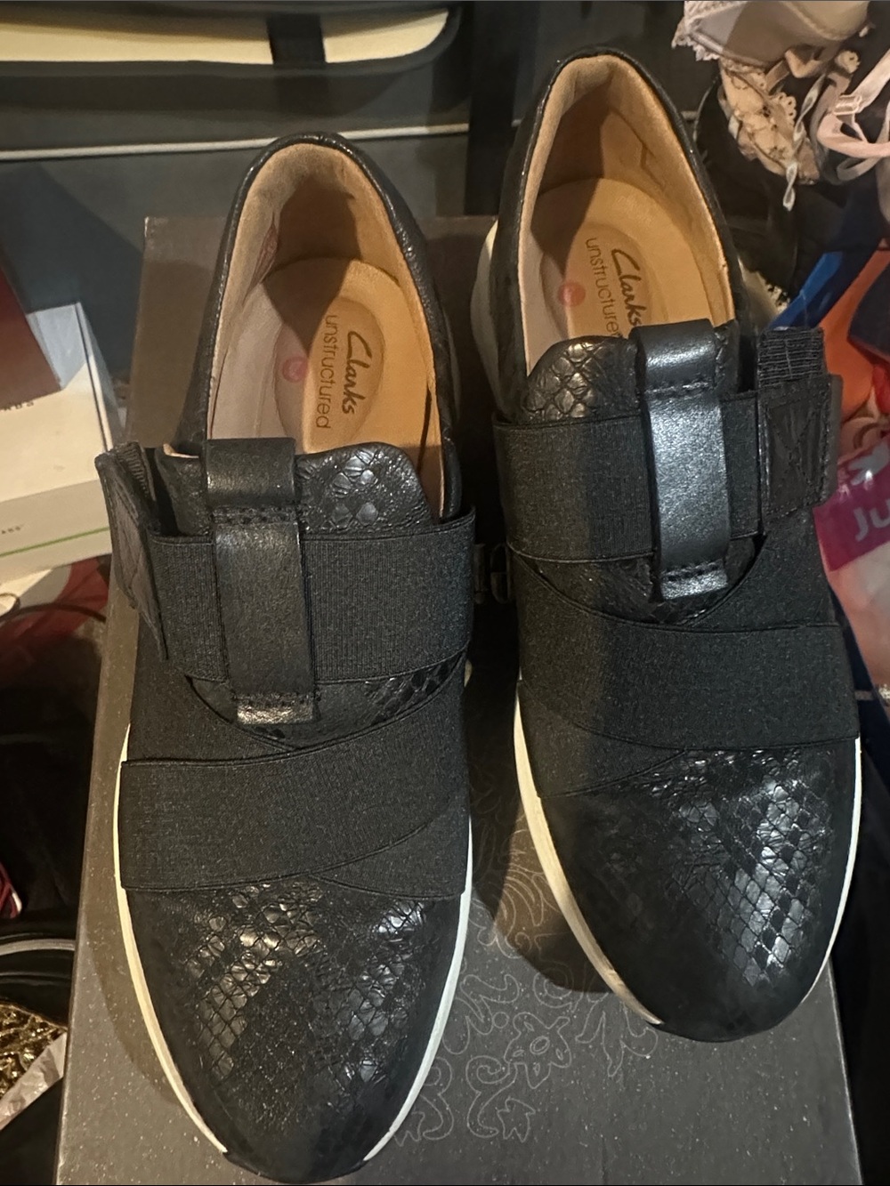 Clarks Black women’s Slip-On snakeskin design Sneakers with Textured Upper